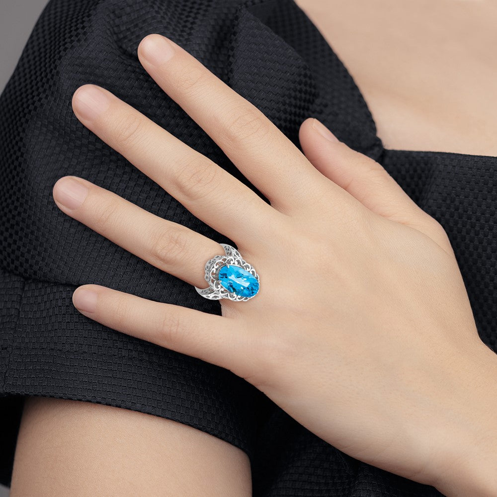 Rhodium Oval Blue Topaz Ring in Sterling Silver